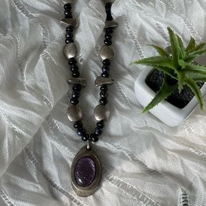 Chunky beads necklace with silver tone pendant and center purple stone